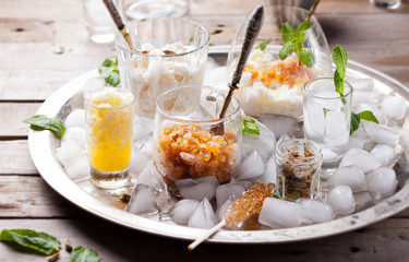 Assortment of granita: tea, coffee, lemon and milk