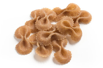 Wholegrain Farfalle Frame. wholemeal. Integral. Close-up photo.