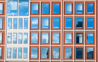 Exterior of modern office building in red bricks 