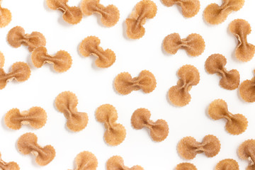 Wholegrain Farfalle Frame. wholemeal. Integral. Close-up photo.