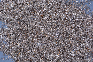 Many chia seeds on slate