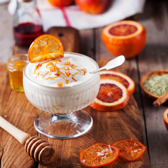 Bloody oranges dessert, ice cream in a glass bowl