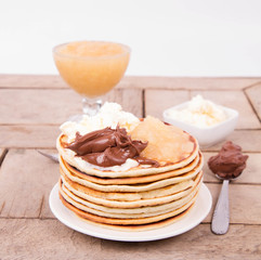 Pancakes with braised apples, mascarpone cheese and chocolate