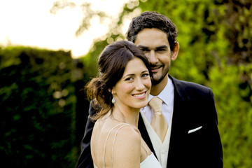 A lovely couple enjoying a very special joy moment during their wedding day, Barcelona, Spain.