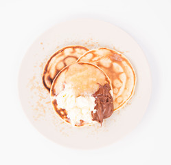 Pancakes with braised apples, mascarpone cheese and chocolate