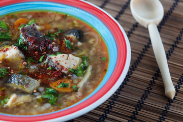 Close up of fish soup with sour cream