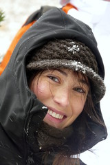 Young woman's portrait under the snow in Pyrenees Mountains, Catalonia, Spain