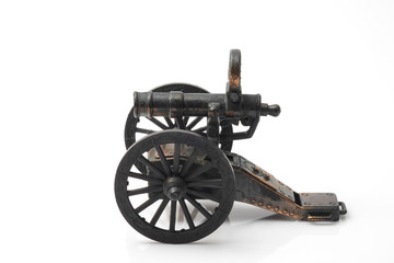 Fototapeta premium Toy cannon / Vintage toy, cannon on white background.