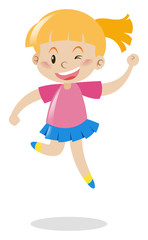 Girl in pink shirt and blue skirt jumping