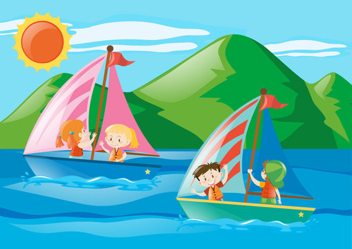Children sailing boats in the sea