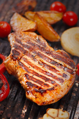 Grilled steak on the grill