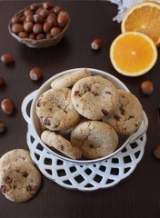 Cookies with berry, chocolate cream and hazelnuts