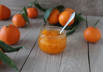 Tangerine jam in a glass jar.A traditional dessert at Christmas and New year.