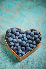 Blueberries in heart shape symbol