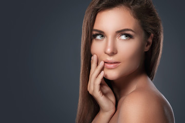 Beautiful  and young woman with a artificial eyelashes