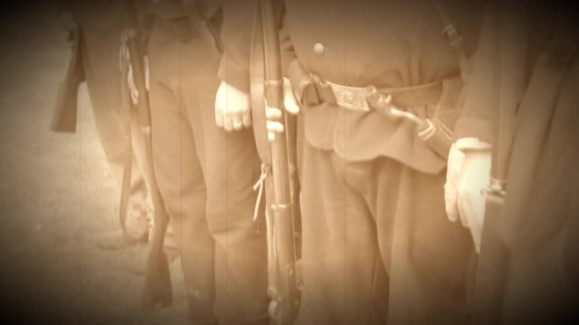 Steady cam shot of Civil War soldiers in a row (Archive Footage Version)