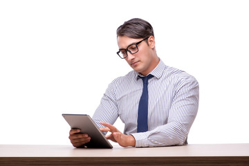Handsome businessman working with tablet computer isolated on wh