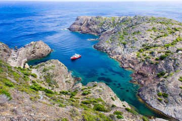 Ship at Cap de Creus, Catalonia, Spain. The most eastern point of Spain and the Iberian Peninsula.