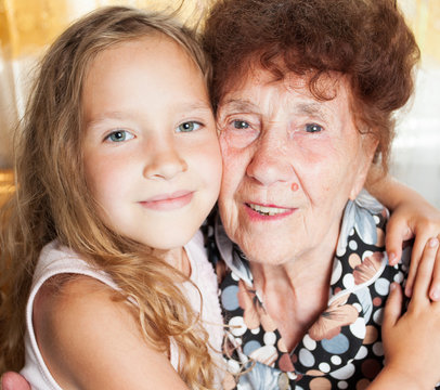 Elderly woman with great-grandchild