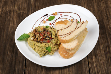 Hummus on the plate with bread