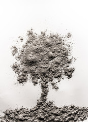 Tree relief shape made of pile of ash, dust