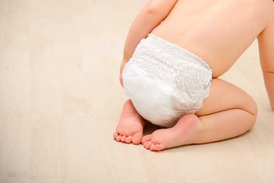 Baby crawling in diaper