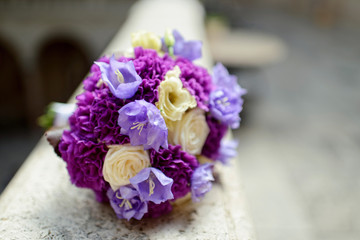 Beautiful wedding colorful bouquet for bride. Beauty of colored flowers. Close-up bunch of florets. Bridal accessories. Female decoration for girl. Details for marriage and for married couple