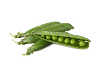 Pods of green peas close up isolated on white background with shadow