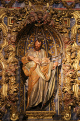 Obraz premium Statue of Saint Joseph in the New Cathedral of Salamanca