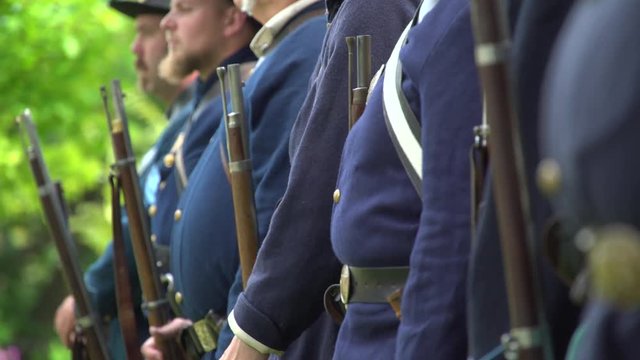 Civil War soldiers prepare to present arms