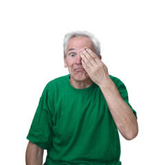 Senior man closed one eye with hand isolated on white background