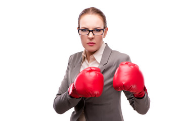 Businewoman with boxing gloves isolated on white