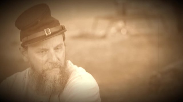 Civil War soldier sitting away from camp (Archive Footage Version)