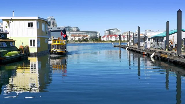 4K Harbor Ferry Taxi Sails into Dock past Houseboats, Fishermans Wharf Victoria