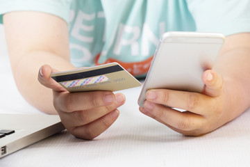 Business, beautiful woman shopping online with laptop and credit