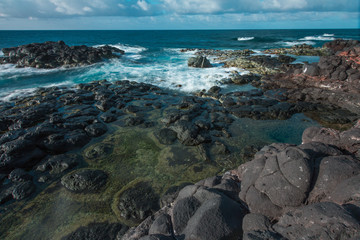 Sunset along the Queens Bath area of Kauai, Hawaii