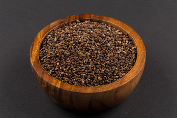 Decorticated cardamom seeds in a bowl