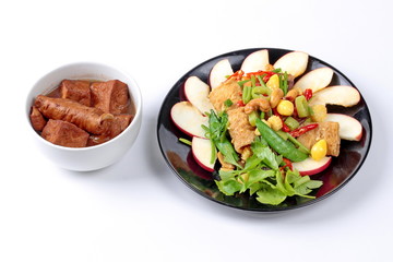 Chinese Vegetable festival  food as fried ginkgo with mixed vegetables served with  fried tofu and fermented flour in brown soup ,  