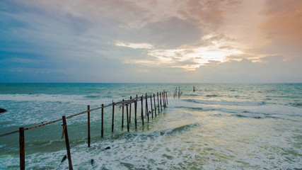 aerial photography the old broken pier made by wood  in the  Andaman sea locate on Phang Nga province Thailand