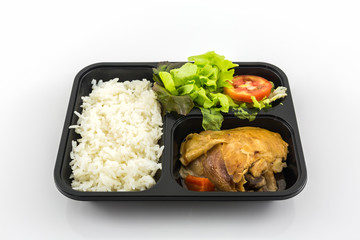 Roasted chicken with rice and vegetable salad.