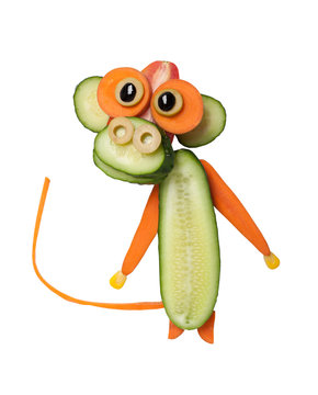 Amusing monkey made of vegetables on isolated background