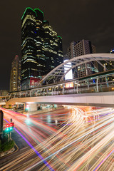 Night cityscape. Bridge link between mrt and bts mass transporta