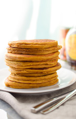 big stack of super healthy pumpkin pancakes for breakfast