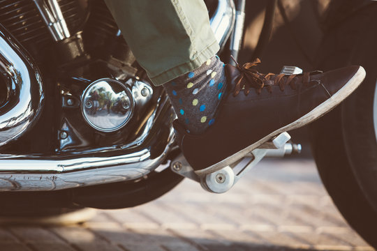 Biker In Leather Shoe On Throttle Pedal