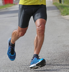 Fototapeta na wymiar muscular runner during a race