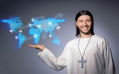 Young christian priest in air travel concept