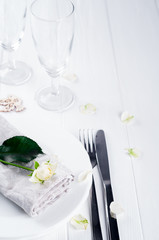 Served plate with napkin and rose close-up