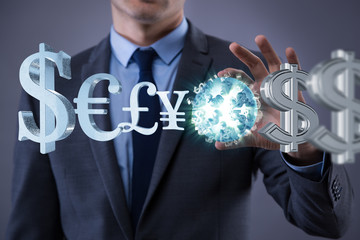 Businessman with various currencies in business concept