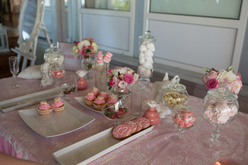 The candy bar with sweets stand in restaurant
