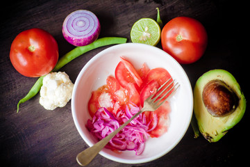 Vegetables on dark wooden table